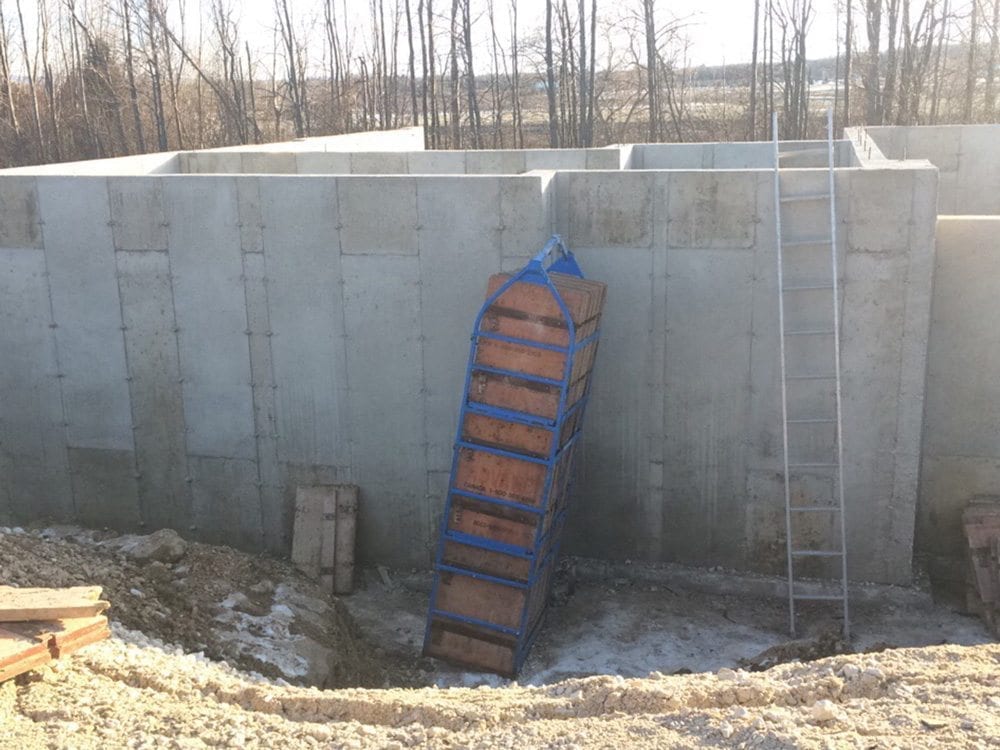Concrete foundation and a ladder